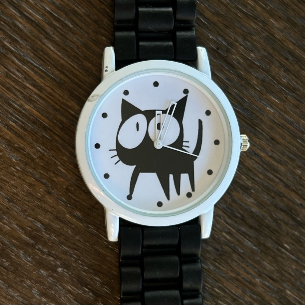 Cat watch, rubber black watch band. Gently used